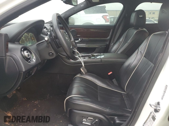 2013 Jaguar XJ with VIN SAJWA2G1XDLV55349, listed as a Copart auction lot 86587444 with 160,513 mi miles and Clean Title. Bid and sale history available at carsss.com. Image 7.