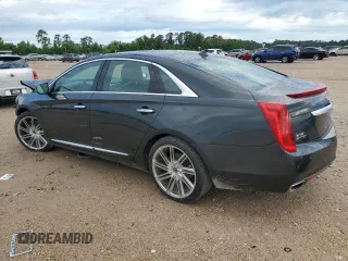 2013 Cadillac XTS Luxury z VIN 2G61P5S33D9217027, wystawiony jako Copart lot #56358835 z przebiegiem 82 644 mil mil oraz Szkoda całkowita • Salvage title. Historia ofert i sprzedaży dostępna na DreamBid. Obrazek 2.