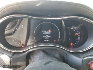 2021 Jeep Grand Cherokee SRT with VIN 1C4RJFDJ5MC584989, listed as a Copart auction lot 71048734 with 68,774 mi miles and Salvage Title. Bid and sale history available at carsss.com. Image 9.