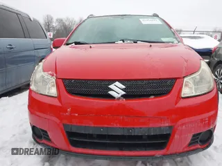 2009 Suzuki SX4 Man Touring Pkg AWD with VIN JS2YB417295101711, listed as a IAAI auction lot 41454641 with 200,540 mi miles. Bid and sale history available at carsss.com. Image 13.