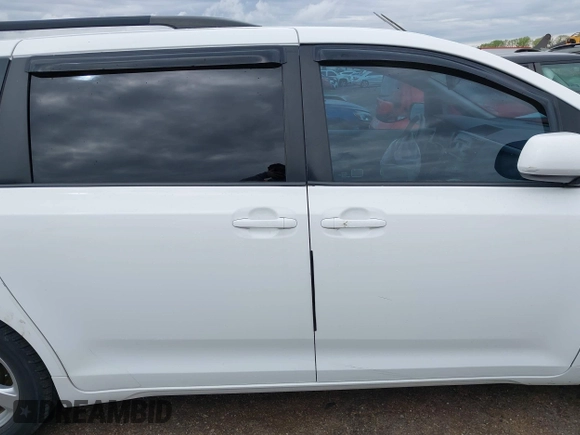 2013 Toyota Sienna LE AAS with VIN 5TDKK3DC1DS382812, listed as a IAAI auction lot 41910799 with 178,315 mi miles and . Bid and sale history available at DreamBid. Image 14.