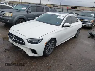 2021 Mercedes-Benz E-Class E 350 with VIN W1KZF8DB8MA897753, listed as a IAAI auction lot 41335129 with 76,873 mi miles. Bid and sale history available at carsss.com. Image 2.
