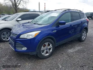 2016 Ford Escape SE with VIN 1FMCU9G99GUC32802, listed as a IAAI auction lot 41958414 with 131,962 mi miles. Bid and sale history available at carsss.com. Image 2.