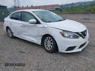 2019 Nissan Sentra S z VIN 3N1AB7AP1KY438766, wystawiony jako IAAI lot #42422648 z przebiegiem 115 413 mil mil oraz . Historia ofert i sprzedaży dostępna na DreamBid. Obrazek 1.