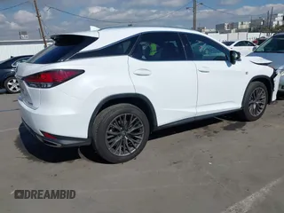 2021 Lexus RX with VIN 2T2SZMDA8MC289158, listed as a IAAI auction lot 41403874 with 84,981 mi miles. Bid and sale history available at carsss.com. Image 4.