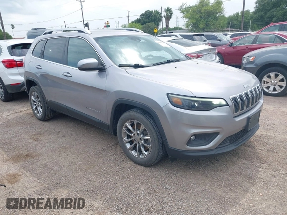 2021 Jeep Cherokee Altitude with VIN 1C4PJLLB2MD164004, listed as a IAAI auction lot 42083946 with 99,136 mi miles and . Bid and sale history available at DreamBid. Image 1.
