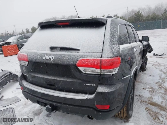 2013 Jeep Grand Cherokee Limited with VIN 1C4RJFBT4DC567444, listed as a IAAI auction lot 41300410 with 121,665 mi miles. Bid and sale history available at carsss.com. Image 4.