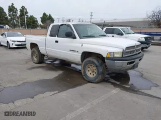 2001 Dodge Ram 1500 with VIN 3B7HF13Z01M555854, listed as a IAAI auction lot 41555752 with 164,111 mi miles. Bid and sale history available at carsss.com. Image 1.