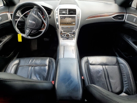 2017 Lincoln MKZ Hybrid Reserve with VIN 3LN6L5MU2HR606497, listed as a Copart auction lot 61377345 with 127,684 mi miles and Clean title. Bid and sale history available at DreamBid. Image 8.