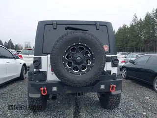 2014 Jeep Wrangler Unlimited Sahara with VIN 1C4BJWEG1EL127232, listed as a IAAI auction lot 41847368 with 109,975 mi miles. Bid and sale history available at carsss.com. Image 16.