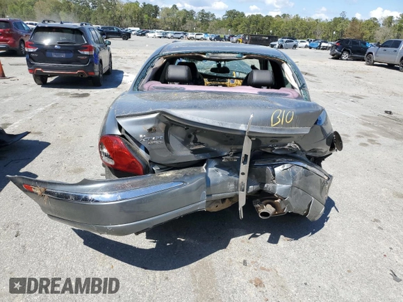 2004 Jaguar X-Type with VIN SAJEA51C04WD91344, listed as a Copart auction lot 49979285 with Not Provided miles and Salvage Title. Bid and sale history available at DreamBid. Image 6.