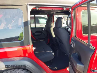 2022 Jeep Wrangler Unlimited Willys with VIN 1C4HJXDN3NW129708, listed as a IAAI auction lot 42025893 with 14,548 mi miles and . Bid and sale history available at DreamBid. Image 8.