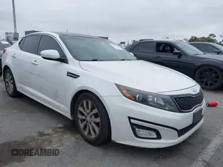 2014 Kia Optima EX z VIN 5XXGN4A79EG271390, wystawiony jako IAAI lot #42279700 z przebiegiem 168 244 mil mil oraz . Historia ofert i sprzedaży dostępna na DreamBid. Obrazek 1.
