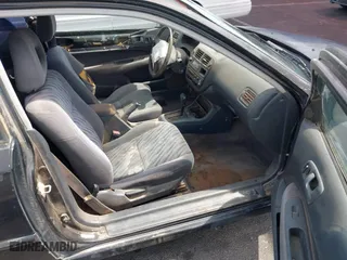 1997 Honda Civic EX with VIN 1HGEJ8243VL096134, listed as a IAAI auction lot 41929243 with 206,195 mi miles. Bid and sale history available at carsss.com. Image 5.