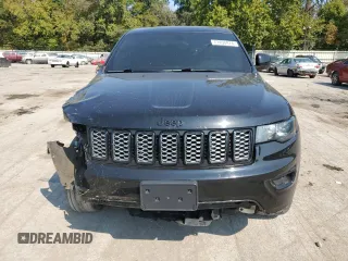 2018 Jeep Grand Cherokee Laredo E with VIN 1C4RJFAG9JC390597, listed as a Copart auction lot 71450474 with 69,645 mi miles and Salvage title. Bid and sale history available at DreamBid. Image 5.