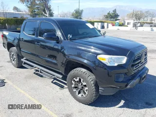 2018 Toyota Tacoma SR with VIN 3TMCZ5AN2JM127244, listed as a IAAI auction lot 41698199 with 61,535 mi miles and . Bid and sale history available at DreamBid. Image 1.