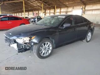 2016 Mazda 6 i Sport z VIN JM1GJ1U50G1461940, wystawiony jako Copart lot #57336855 z przebiegiem 142 452 mil mil oraz Szkoda całkowita • Salvage title. Historia ofert i sprzedaży dostępna na DreamBid. Obrazek 1.