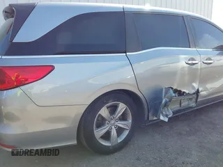 2019 Honda Odyssey EX-L with VIN 5FNRL6H79KB043145, listed as a IAAI auction lot 41569198 with 94,560 mi miles. Bid and sale history available at carsss.com. Image 6.