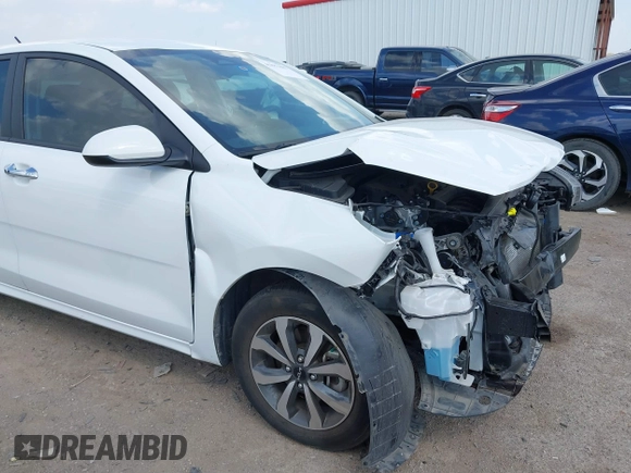 2023 Kia Rio S z VIN 3KPA24AD7PE550899, wystawiony jako IAAI lot #41882407 z przebiegiem 24 966 mil mil oraz . Historia ofert i sprzedaży dostępna na DreamBid. Obrazek 6.