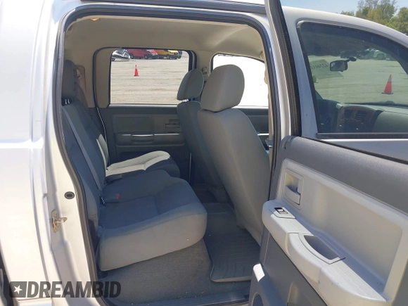 2005 Dodge Dakota SLT with VIN 1D7HW48N45S321002, listed as a IAAI auction lot 42240338 with 214,983 mi miles and . Bid and sale history available at DreamBid. Image 8.