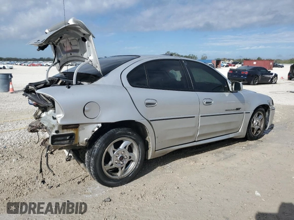 2002 Pontiac Grand Am GT with VIN 1G2NW52E02M507684, listed as a Copart auction lot 85694244 with 236,477 mi miles and Salvage Title. Bid and sale history available at carsss.com. Image 3.
