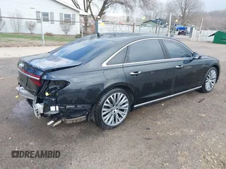 2019 Audi A8 L with VIN WAU8DAF84KN019115, listed as a IAAI auction lot 41856931 with 84,387 mi miles. Bid and sale history available at carsss.com. Image 4.
