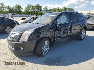 2015 Cadillac SRX Performance Collection with VIN 3GYFNCE37FS548248, listed as a Copart auction lot 58250325 with 61,177 mi miles and Salvage title. Bid and sale history available at DreamBid. Image 1.