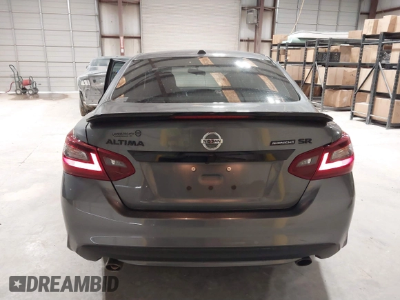 2018 Nissan Altima 2.5 SR with VIN 1N4AL3AP1JC203798, listed as a IAAI auction lot 41853789 with 77,875 mi miles. Bid and sale history available at carsss.com. Image 16.