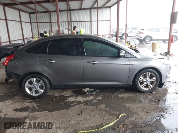 2013 Ford Focus SE with VIN 1FADP3F29DL243937, listed as a IAAI auction lot 42145911 with 90,376 mi miles and . Bid and sale history available at DreamBid. Image 13.