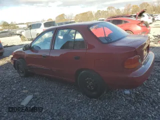 1997 Hyundai Accent z VIN KMHVF24N5VU369924, wystawiony jako Copart lot #85036114 z przebiegiem 168 797 mil mil oraz Szkody całkowita. Historia ofert i sprzedaży dostępna na DreamBid. Obrazek 2.