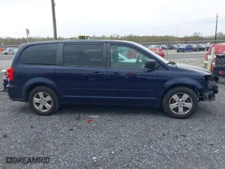 2013 Dodge Grand Caravan SXT with VIN 2C4RDGBG3DR580080, listed as a IAAI auction lot 41886294 with 143,074 mi miles. Bid and sale history available at carsss.com. Image 14.