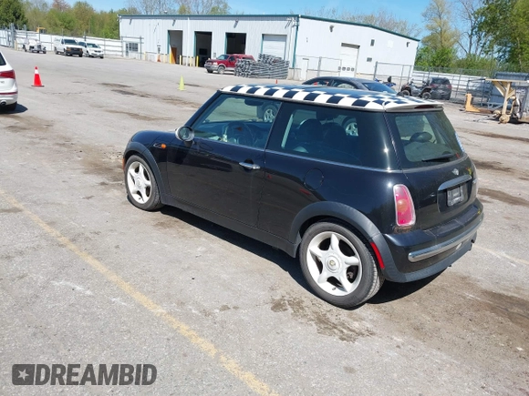 2003 MINI Hardtop with VIN WMWRC33463TC41773, listed as a IAAI auction lot 42223276 with 115,127 mi miles and . Bid and sale history available at DreamBid. Image 3.