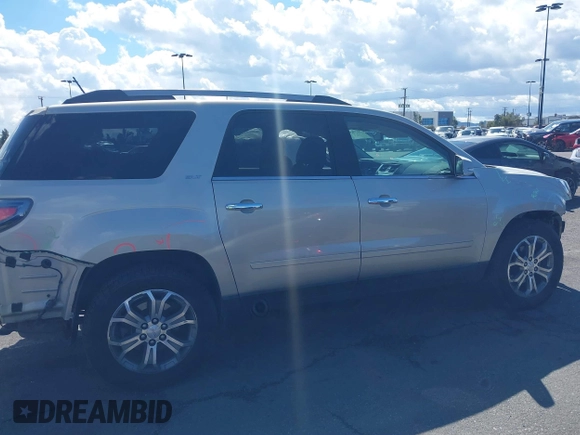 2014 GMC Acadia SLT z VIN 1GKKRSKD2EJ141913, wystawiony jako IAAI lot #41738536 z przebiegiem 100 577 mil mil oraz . Historia ofert i sprzedaży dostępna na DreamBid. Obrazek 13.
