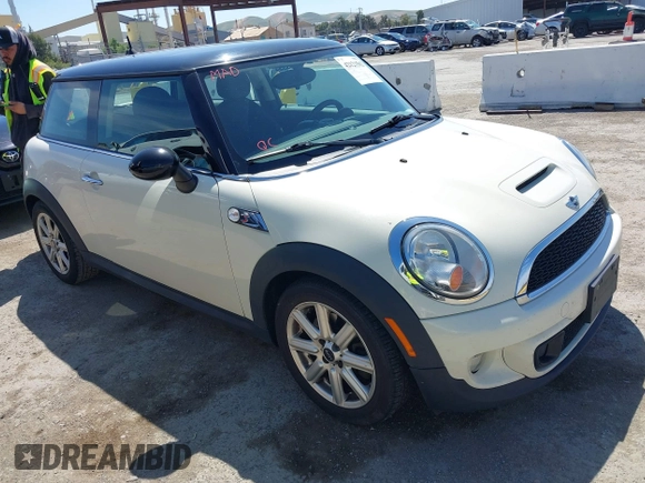 2011 MINI Hardtop S with VIN WMWSV3C50BTY23450, listed as a IAAI auction lot 42121502 with 239,025 mi miles and . Bid and sale history available at DreamBid. Image 1.