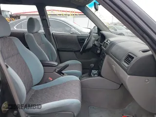 1999 Subaru Forester L with VIN JF1SF6351XH702931, listed as a IAAI auction lot 41612373 with 149,171 mi miles. Bid and sale history available at carsss.com. Image 5.