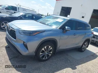2023 Toyota Highlander L with VIN 5TDKDRBH5PS012608, listed as a IAAI auction lot 42702499 with 61,129 mi miles and . Bid and sale history available at DreamBid. Image 14.