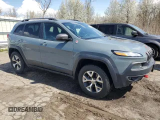 2014 Jeep Cherokee Trailhawk with VIN 1C4PJMBB4EW203320, listed as a Copart auction lot 53875305 with 112,425 mi miles and Clean Title. Bid and sale history available at carsss.com. Image 4.