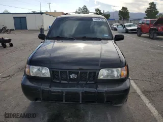 2002 Kia Sportage with VIN KNDJA723325155200, listed as a Copart auction lot 66326204 with 85,381 mi miles and Salvage Title. Bid and sale history available at carsss.com. Image 5.