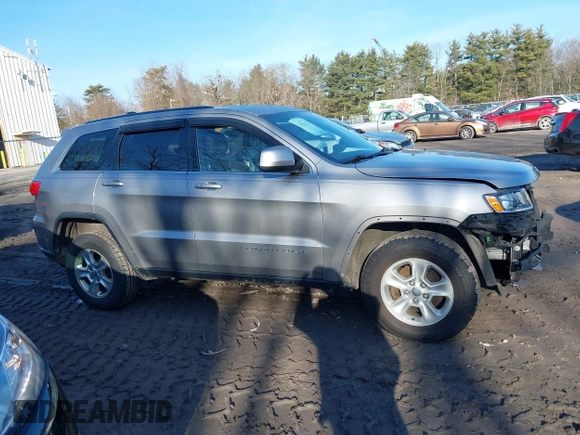 2015 Jeep Grand Cherokee Laredo with VIN 1C4RJFAG9FC775004, listed as a IAAI auction lot 41754534 with 116,893 mi miles. Bid and sale history available at carsss.com. Image 13.