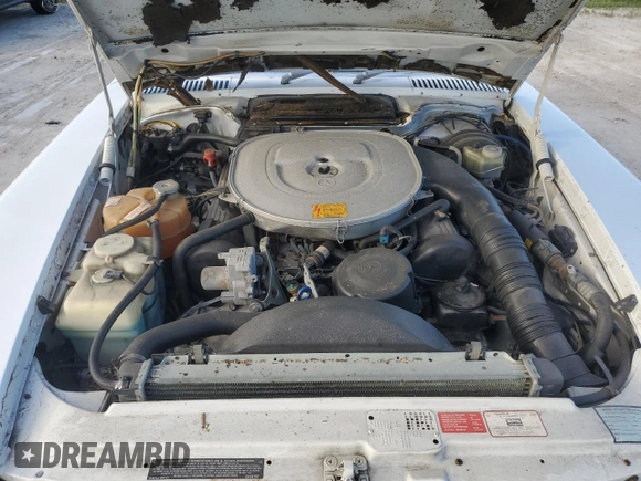 1989 Mercedes-Benz 560 SL z VIN WDBBA48DXKA096297, wystawiony jako Copart lot #75597074 z przebiegiem 70 152 mil mil oraz Szkoda całkowita • Salvage title. Historia ofert i sprzedaży dostępna na DreamBid. Obrazek 11.