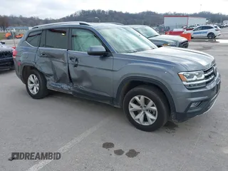 2018 Volkswagen Atlas SE z VIN 1V2LR2CA6JC520916, wystawiony jako IAAI lot #41124055 z przebiegiem 80 404 mil mil oraz . Historia ofert i sprzedaży dostępna na DreamBid. Obrazek 1.