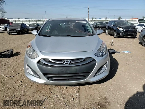 2013 Hyundai Elantra GT with VIN KMHD35LE4DU117801, listed as a Copart auction lot 74888134 with 97,453 mi miles and Salvage Title. Bid and sale history available at carsss.com. Image 10.