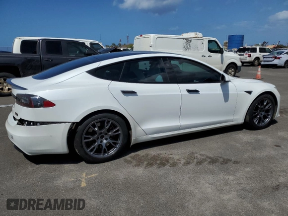 2021 Tesla Model S Plaid с VIN 5YJSA1E66MF453717, выставлен на аукционе Copart как лот 49330355 с пробегом 64 458 миль миль и Списание • Salvage title. История ставок и продаж доступна на DreamBid. Изображение 3.