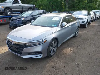2020 Honda Accord Touring z VIN 1HGCV2F93LA017701, wystawiony jako IAAI lot #42383938 z przebiegiem 40 945 mil mil oraz . Historia ofert i sprzedaży dostępna na DreamBid. Obrazek 18.