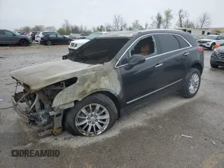 2018 Cadillac XT5 FWD с VIN 1GYKNARS0JZ238653, выставлен на аукционе Copart как лот 51762065 с пробегом Не указан миль и Списание • Salvage title. История ставок и продаж доступна на DreamBid. Изображение 1.