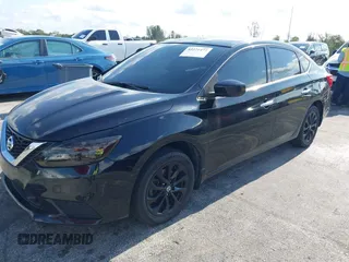 2018 Nissan Sentra S with VIN 3N1AB7AP2JY326055, listed as a IAAI auction lot 42221477 with 123,570 mi miles and . Bid and sale history available at DreamBid. Image 2.