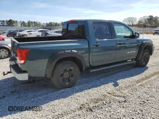 2007 Nissan Titan SE with VIN 1N6BA07A67N210908, listed as a Copart auction lot 48700705 with 162,395 mi miles and Salvage title. Bid and sale history available at DreamBid. Image 3.
