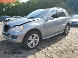 2011 Mercedes-Benz M 350 with VIN 4JGBB5GB4BA736682, listed as a Copart auction lot 60149665 with 122,375 mi miles and Salvage title. Bid and sale history available at DreamBid. Image 1.