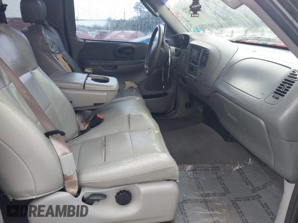 2003 Ford F-150 XL with VIN 1FTRX17L13NA01819, listed as a IAAI auction lot 42719787 with Not provided miles and . Bid and sale history available at DreamBid. Image 5.