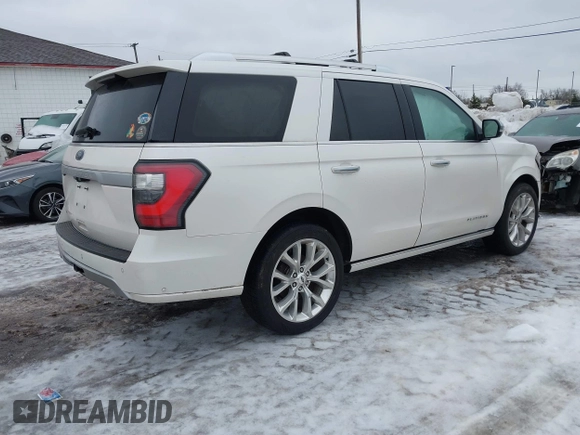 2019 Ford Expedition Platinum with VIN 1FMJU1MT8KEA24308, listed as a IAAI auction lot 41510256 with 143,011 mi miles. Bid and sale history available at carsss.com. Image 4.